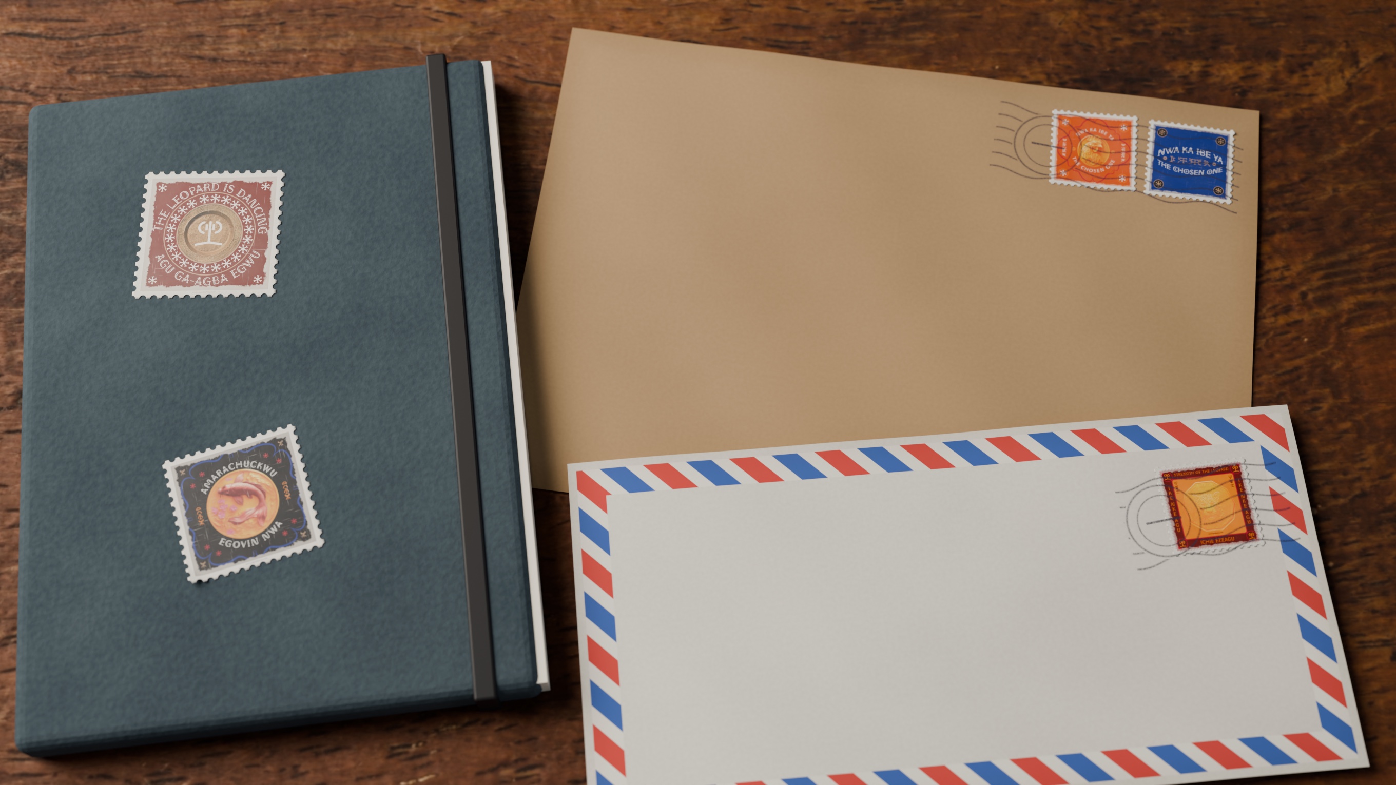 Postage-size Agụ Display stamps on a wooden desk: two on a dark green notebook, two postmarked on a kraft envelope and one postmarked on an airmail envelope